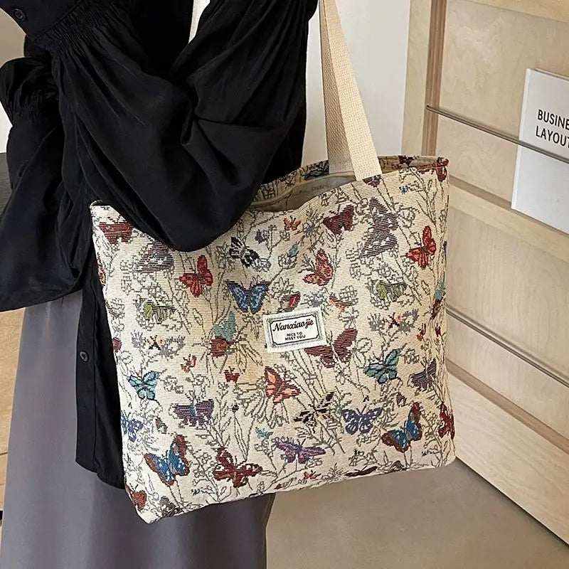 Schicke Canvas-Handtasche mit großem Fassungsvermögen und buntem Schmetterlings- und Blumendesign – modische Umhängetasche mit Reißverschluss